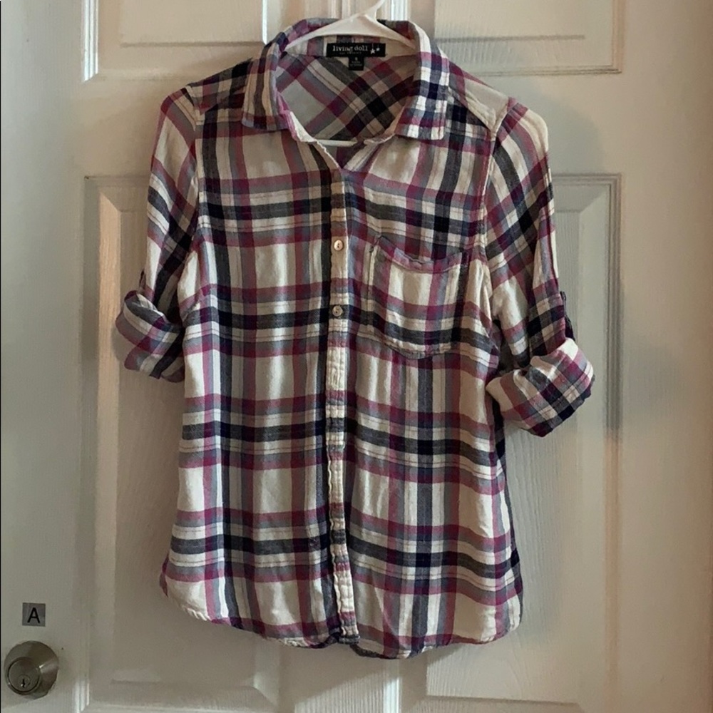 Plaid button up shirt.